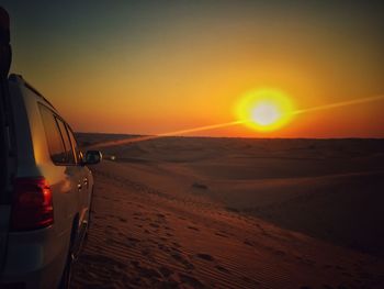 Scenic view of landscape against sky during sunset