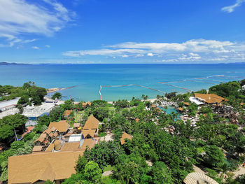 High angle view of townscape by sea against sky at pattaya, thailand