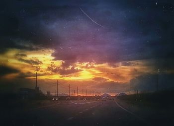 Scenic view of road against cloudy sky