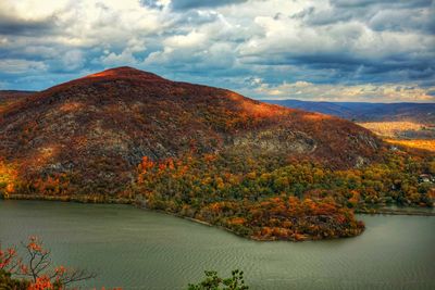 Scenic view of lake against sky during autumn