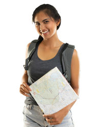 Portrait of a smiling young woman against white background