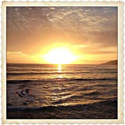 Scenic view of sea at sunset