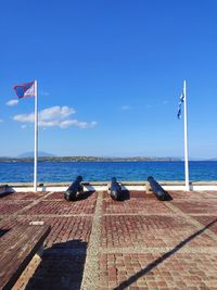 Scenic view of sea against blue sky