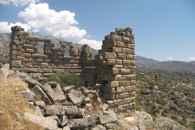 Old ruin against mountains