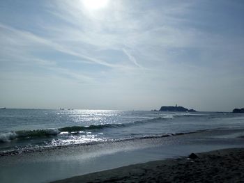 Scenic view of beach and sea against sky