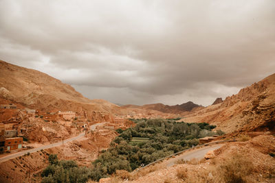 Scenic view of landscape and mountains against sky