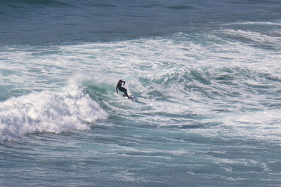 Man surfing in sea