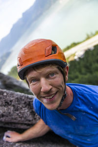 Portrait of climber looking nice with helmet on a multipitch climb