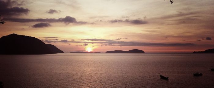 Scenic view of sea at sunset