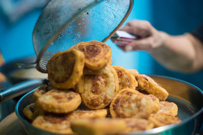 Close-up of person preparing food