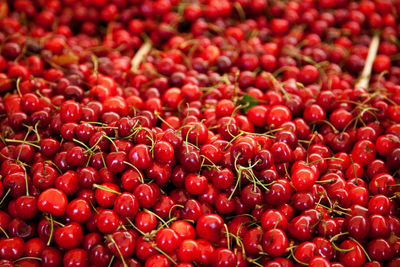 Full frame shot of fresh cherries for sale at market stall