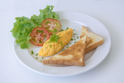 High angle view of breakfast served in plate