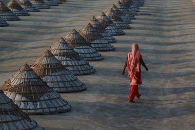 Rear view of woman with umbrella