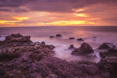 Scenic view of sea against sky during sunset