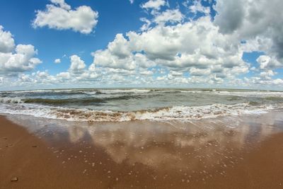 Scenic view of beach against sky