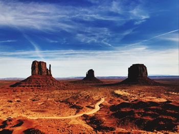 Scenic view of rock formations against sky