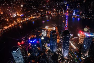 High angle view of illuminated cityscape at night