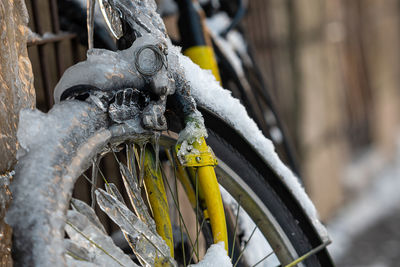 Close-up of bicycle on snow