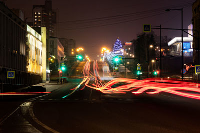 Light trails on city street at night