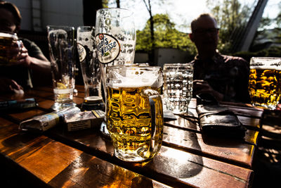 Close-up of beer glass on table