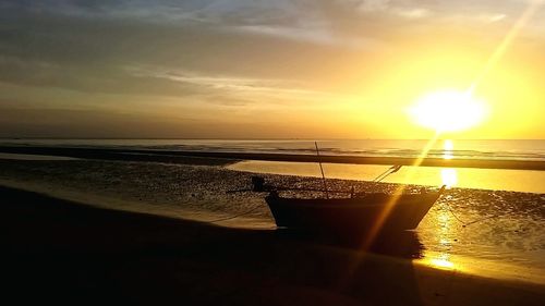 Scenic view of sea at sunset