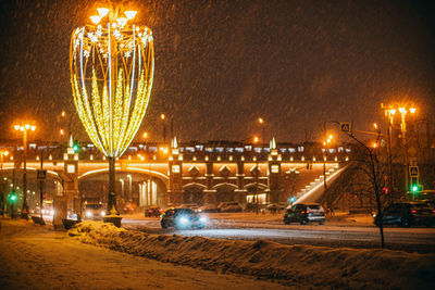 Illuminated street lights at night