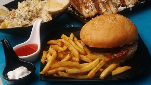 High angle view of burger in plate on table