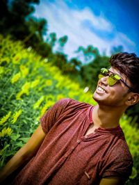 Portrait of young man wearing sunglasses