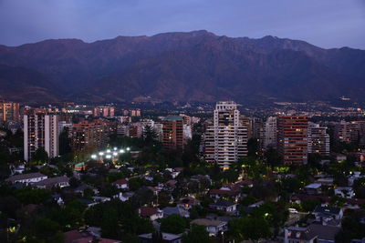 High angle view of illuminated buildings in city