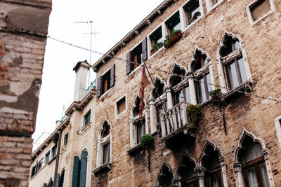 Low angle view of buildings against sky