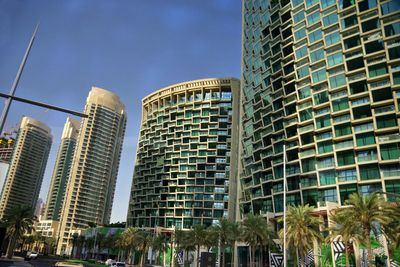 Low angle view of modern buildings against sky