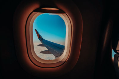 Airplane seen through window