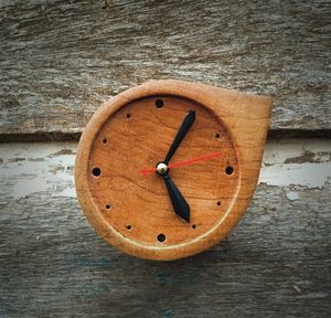 High angle view of clock on table