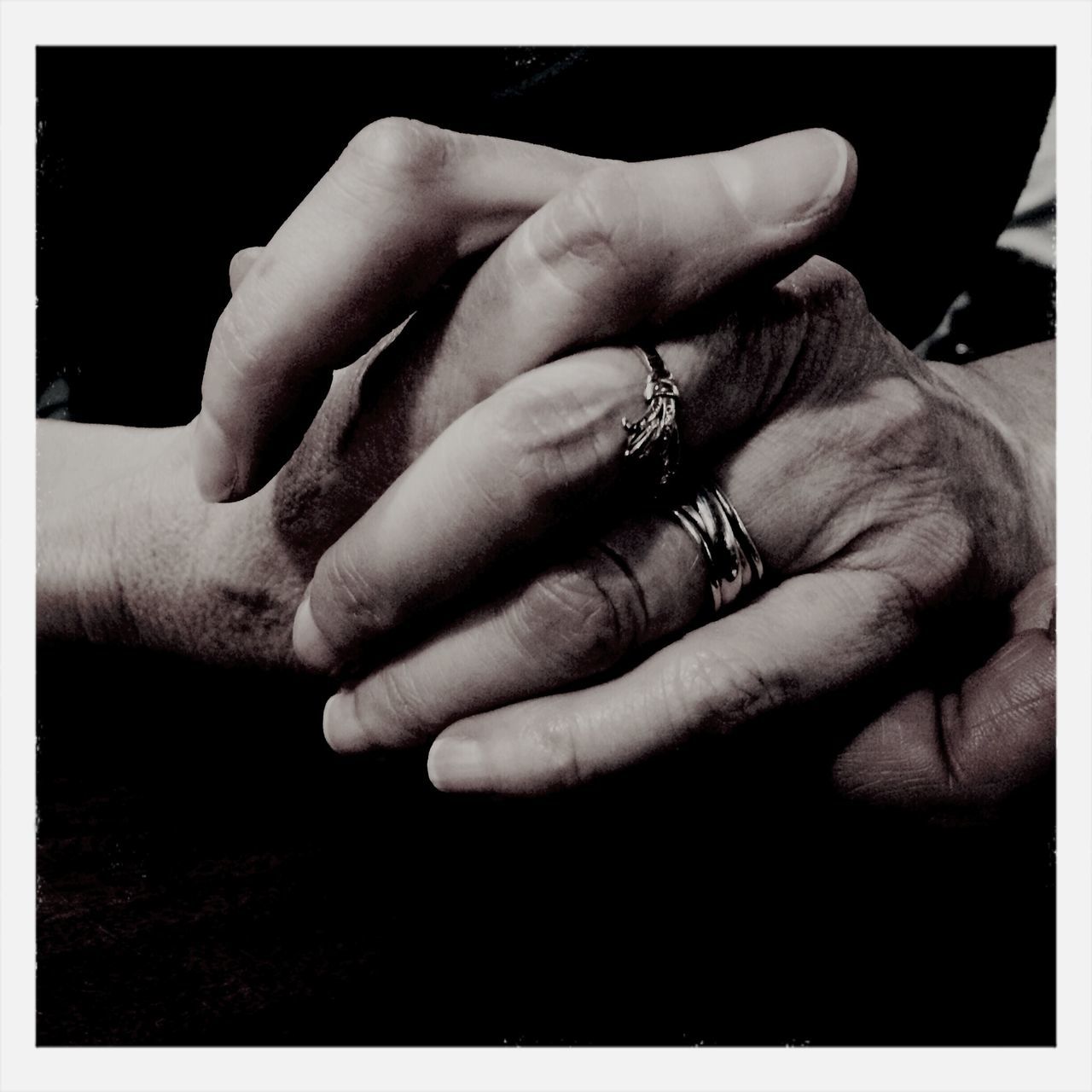 person, transfer print, part of, auto post production filter, human finger, indoors, lifestyles, close-up, men, togetherness, cropped, love, bonding, holding, holding hands