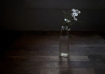 Flower vase on table at home