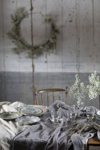 Plates and wineglasses on table