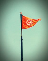 Low angle view of flag against sky