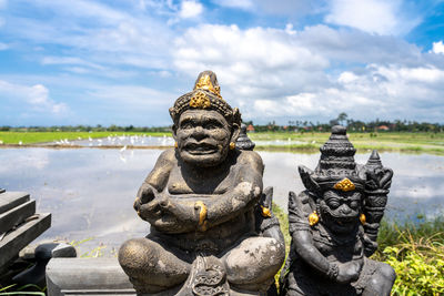 Buddha statue against sky