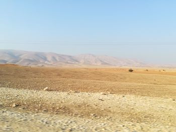 Scenic view of mountains against clear sky