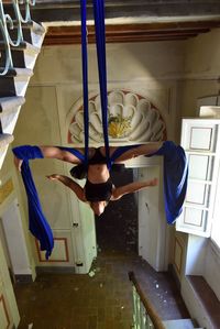 High angle view of woman at staircase