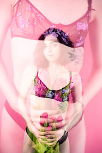 Midsection of woman wearing lingerie