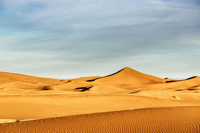 Scenic view of desert against sky