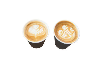 Close-up of coffee cup against white background