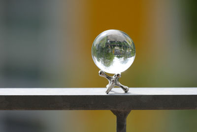 Close-up of bubbles against railing