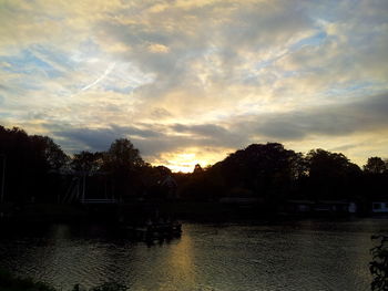 Scenic view of cloudy sky at sunset