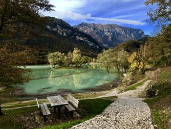 Scenic view of lake and mountains against sky