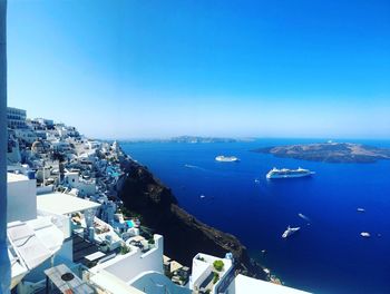 High angle view of sea against clear blue sky