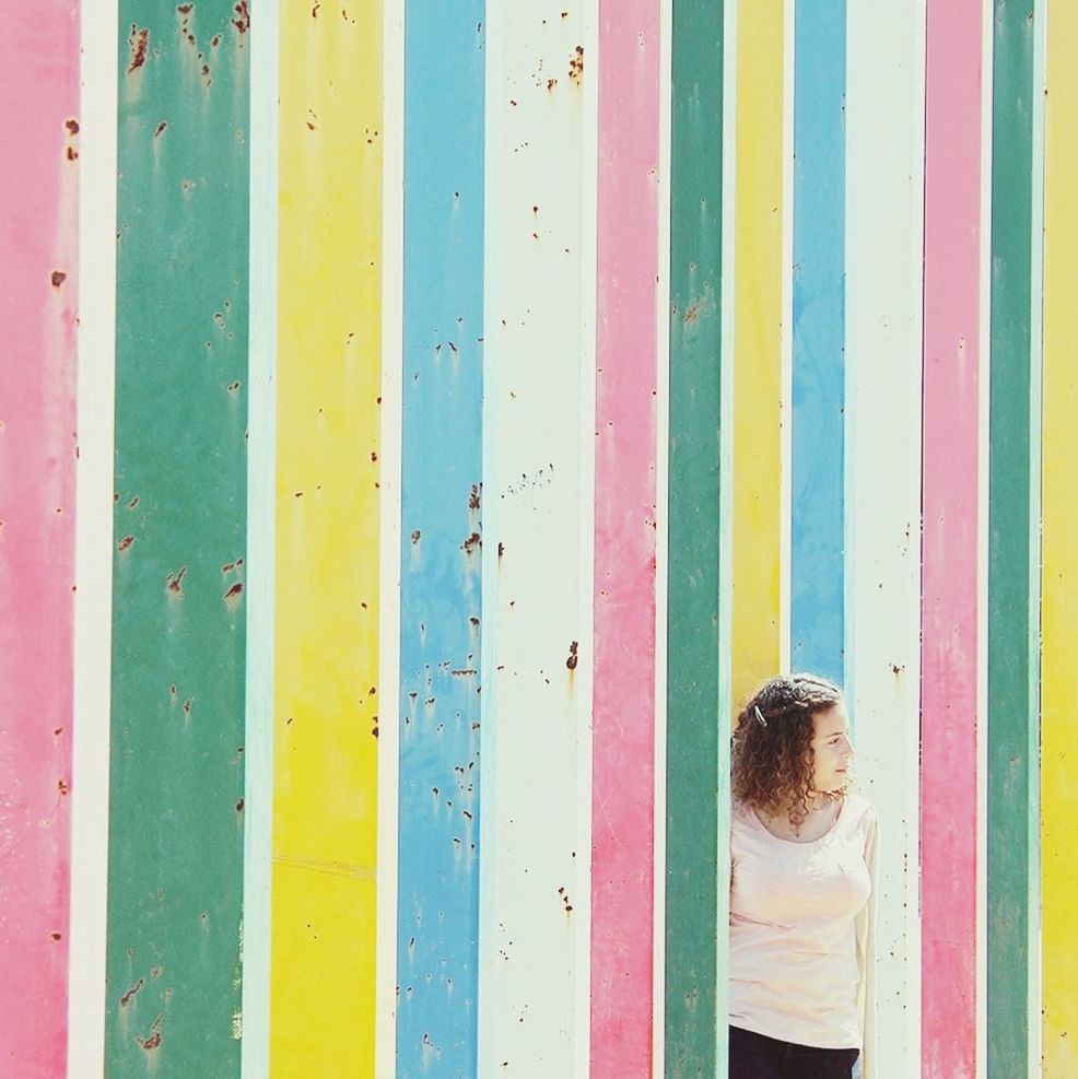 multi colored, blue, built structure, yellow, protection, architecture, close-up, colorful, day, safety, outdoors, building exterior, childhood, wood - material, striped, red, closed, full frame, wall - building feature, pattern