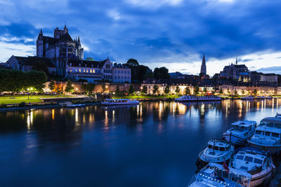 Illuminated buildings in water