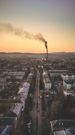 High angle view of cityscape against sky during sunset